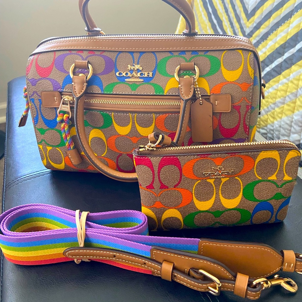 Coach satchel small pen mark on back of tag still looks new comes with wristlet